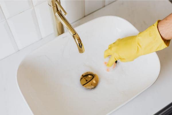 remove hard water stains on chrome kitchen faucets